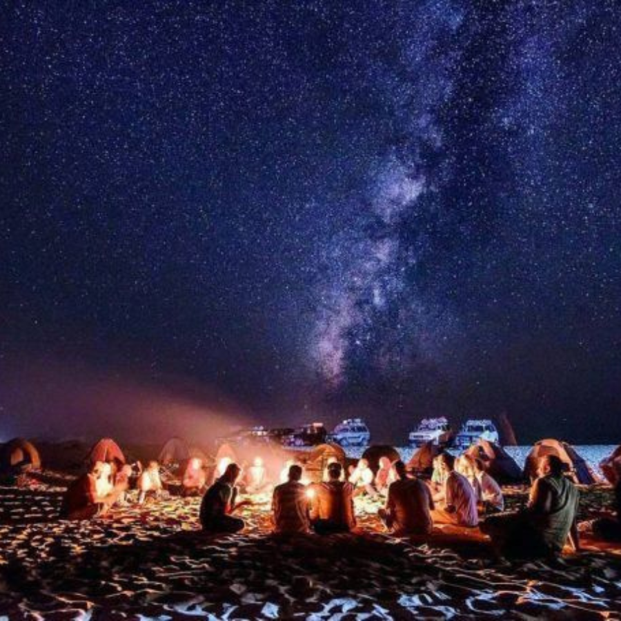 Camping under the stars in the tranquil White Desert, Egypt, during a safari tour