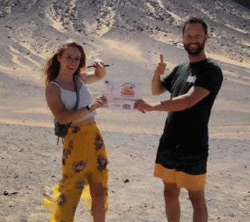 Black Desert Egypt tours– Egypt Camp White Desert travelers exploring volcanic mountains