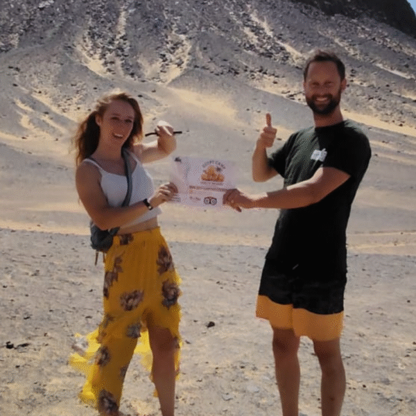 Black Desert Egypt – Egypt Camp White Desert travelers exploring volcanic mountains